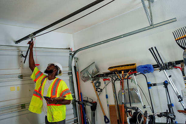 Professional Garage Door Panel Replacement technician working in Attleboro, MA